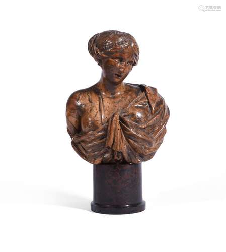 A CARVED WALNUT BUST OF A LADY, LATE 17TH CENTURY