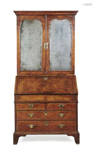 A QUEEN ANNE WALNUT BUREAU BOOKCASE, CIRCA 1710