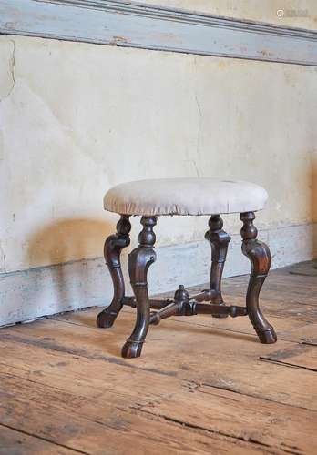 A QUEEN ANNE BEECH AND UPHOLSTERED CIRCULAR STOOL, CIRCA 171...