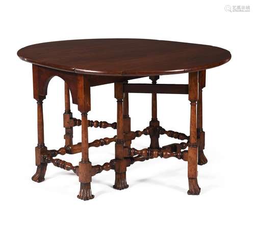 A RARE GEORGE I PADOUK GATELEG DINING TABLE, CIRCA 1720