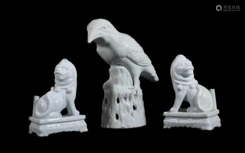 A PAIR OF BLANC DE CHINE LION JOSS-STICK HOLDERS, 18TH OR 19...