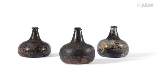 THREE GLASS ONION WINE BOTTLES, EARLY 18TH CENTURY