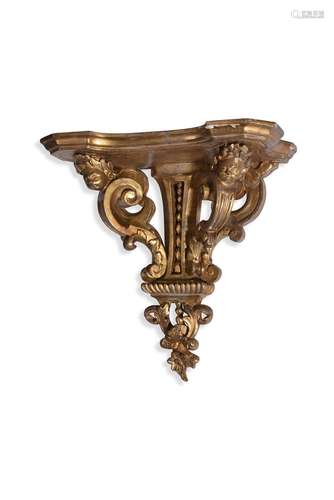 A QUEEN ANNE GILTWOOD WALL BRACKET, IN THE MANNER OF JEAN PE...