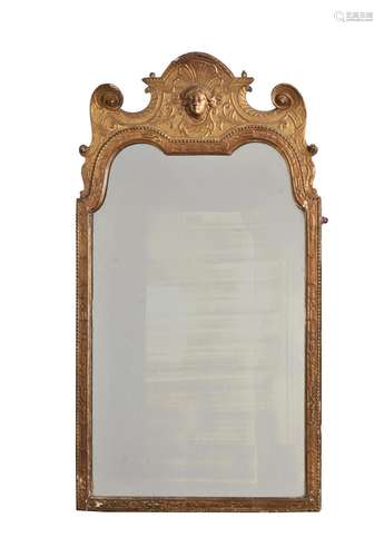 A GEORGE I CARVED GILTWOOD AND GESSO WALL MIRROR, ATTRIBUTED...