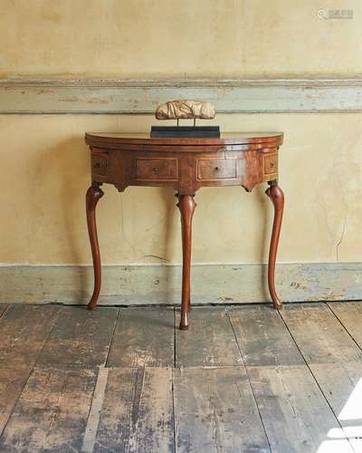 A QUEEN ANNE WALNUT AND CHEVRON STRUNG DEMI-LUNE CARD TABLE,...