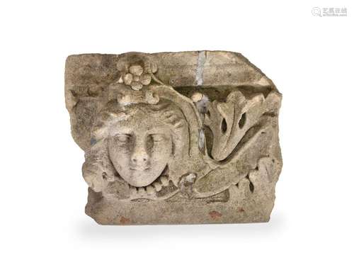 A CARVED STONE FRAGMENT OF A FEMALE FACE, ENGLISH LATE 17TH ...