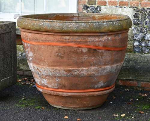 A LARGE TUSCAN TERRACOTTA PLANTER OR GARDEN URN, WITH IMPRES...