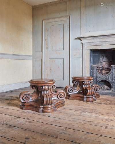 A PAIR OF ITALIAN CARVED WALNUT VASE STANDS, 18TH CENTURY