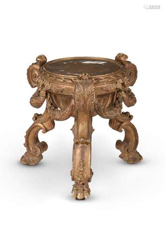 A CARVED GILTWOOD VASE STAND IN THE BAROQUE STYLE, 19TH CENT...