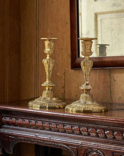 A PAIR OF LOUIS XV ORMOLU CANDLESTICKS, MID 18TH CENTURY