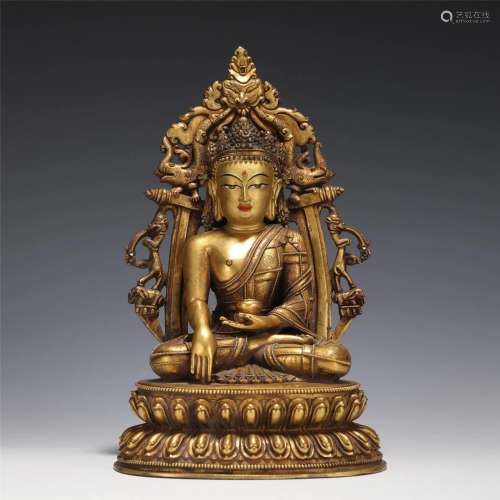 A Tibetan Bronze-Gilt Medicine Buddha