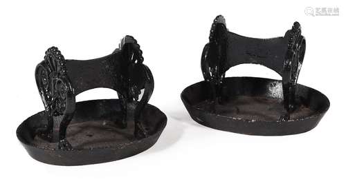 A PAIR OF REGENCY CAST IRON AND BLACK PAINTED BOOT SCRAPES I...