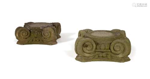 A PAIR OF SCULPTED LIMESTONE IONIC ORDER CAPITALS, LATE 18TH...