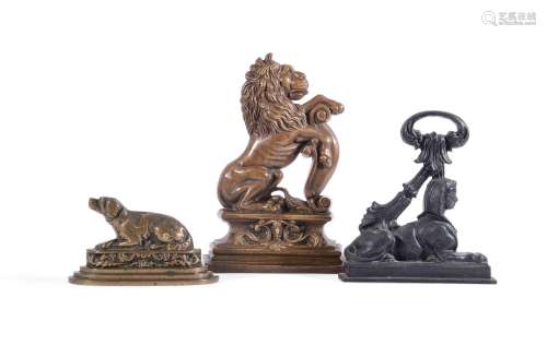 THREE DOOR PORTERS INCLUDING A BRONZE OR BELL METAL SEATED D...
