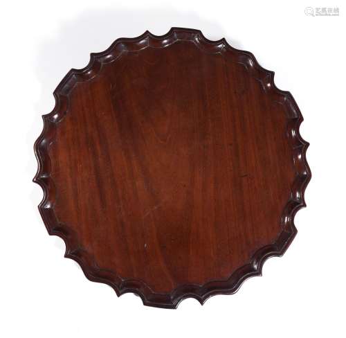 A GEORGE III MAHOGANY 'PIE CRUST' TRAY, CIRCA 1770