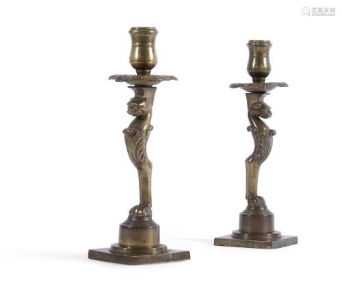 A PAIR OF REGENCY BRASS CANDLESTICKS, IN THE MANNER OF THOMA...