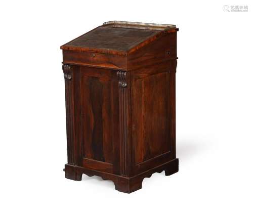Y A REGENCY ROSEWOOD DAVENPORT, IN THE MANNER OF GILLOWS, CI...