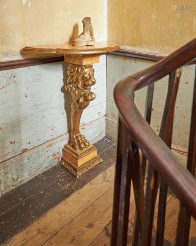 A GILTWOOD AND SIMULATED MARBLE CONSOLE TABLE, IN THE MANNER...