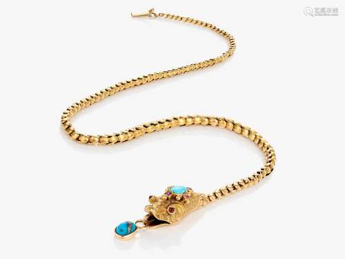A necklace with snake head, turquoise and rubies