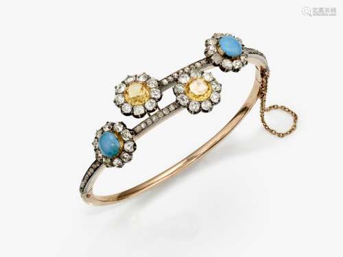 A bangle with yellow topazes, brilliant cut diamonds and tur...