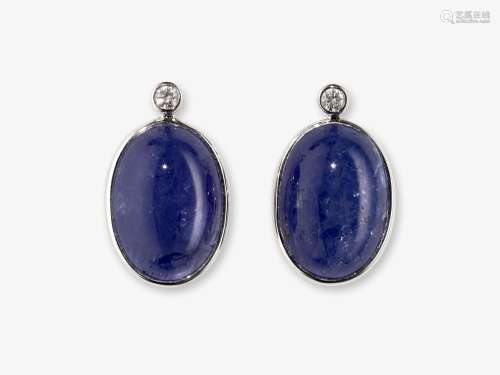 Classic stud earrings decorated with tanzanites and brillian...