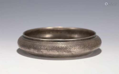 An Incised Silver Washer