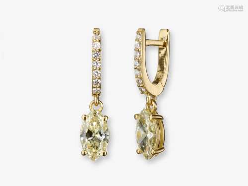 A pair of drop earrings decorated with marquise cut and bril...