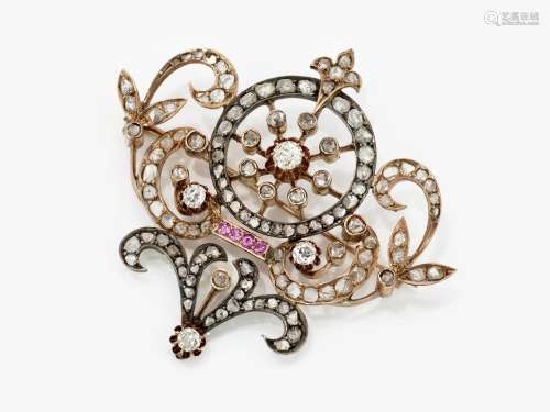 A brooch with diamonds and rubies