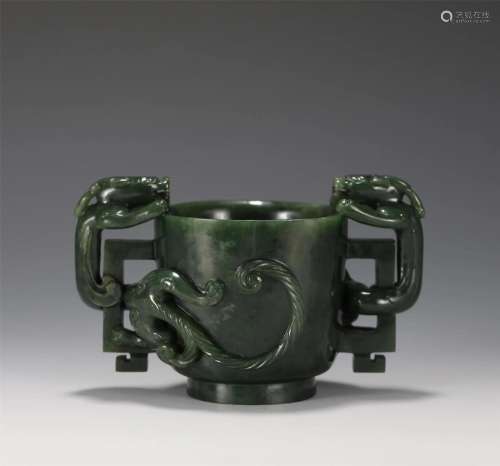 A Carved Spinach Green Jade Cup