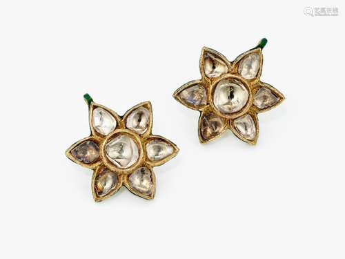 Indian floral \"Karanfool\" stud earrings decorate...