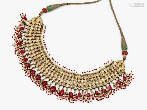 A magnificently decorated Indian wedding necklace studded wi...