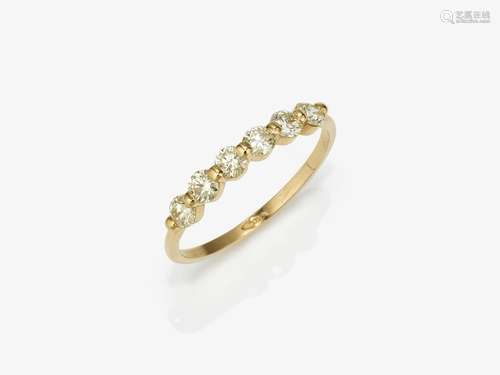 An eternity ring with brilliant cut diamonds