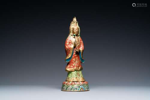 Lot 777: A CHINESE CHAMPLEVE ENAMEL AND GILT COPPER FIGURE O...