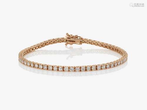 A Tennis bracelet decorated with brilliant cut diamonds