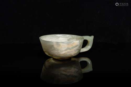 Lot 787: A CHINESE MOTTLED CELADON JADE WINE CUP, QING