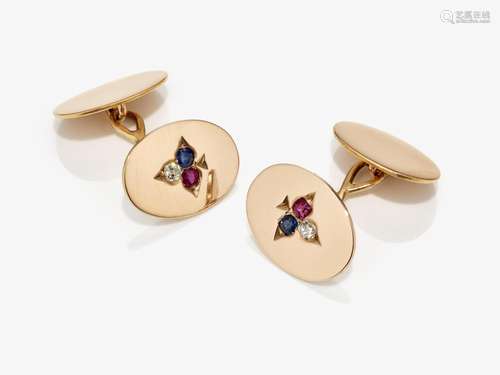 A pair of cufflinks with cloverleaf, diamonds, rubies and sa...