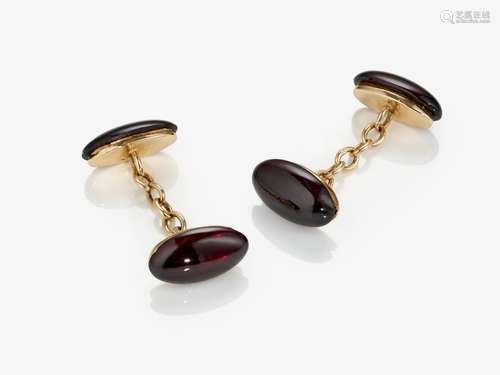 A pair of garnet cufflinks