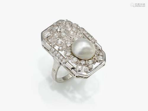 A ring with cultured pearl and diamonds