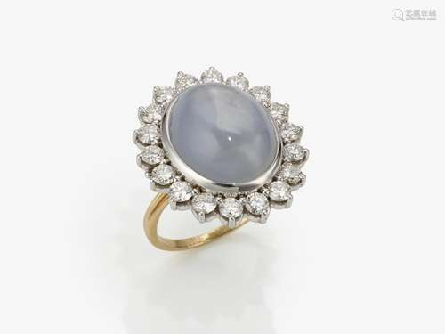 A ring with sapphire and brilliant cut diamonds