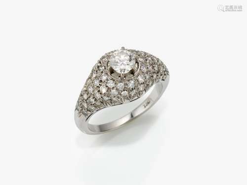 A ring with a brilliant cut diamond and octagonal diamonds