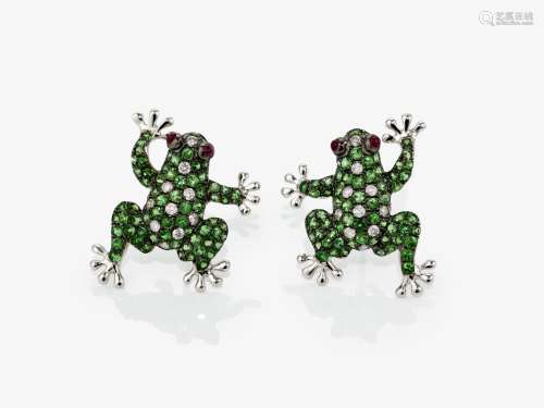 A pair of \"frog\" stud earrings decorated with ts...
