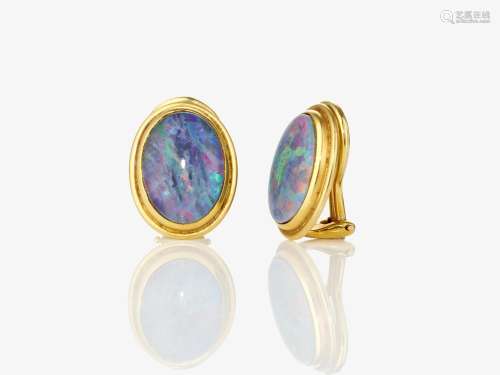 A pair of ear clips with opals