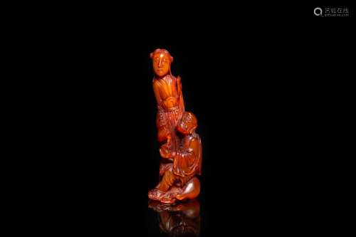 Lot 873: A CHINESE CARVED BUFFALO HORN GROUP, QING