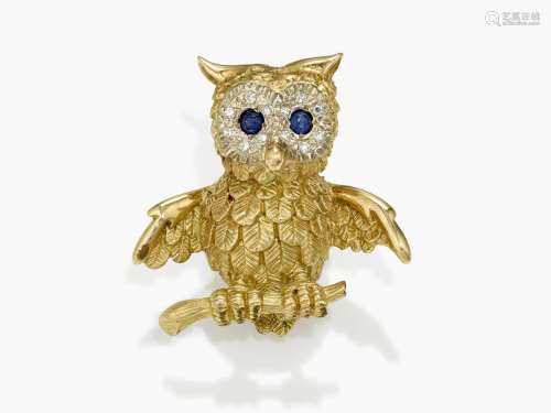 An owl brooch