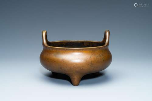 Lot 858: A CHINESE BRONZE TRIPOD CENSER, XUANDE MARK, 18TH C...