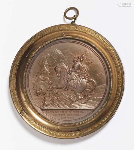 A medal depicting Bonaparte crossing the Alps at the Great S...