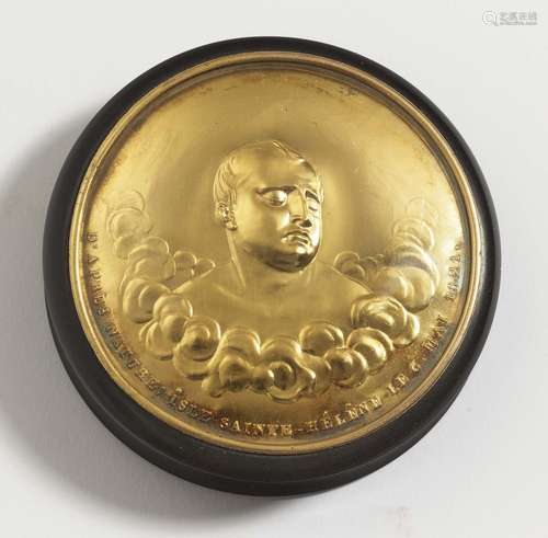 A box with a medallion depicting the recently deceased Napol...