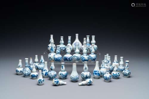 Lot 932: THIRTY-SEVEN CHINESE BLUE AND WHITE MINIATURE VASES...