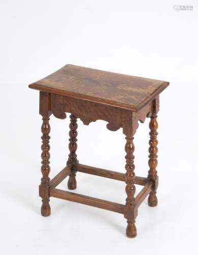 Walnut stool with turned legs. 17th century