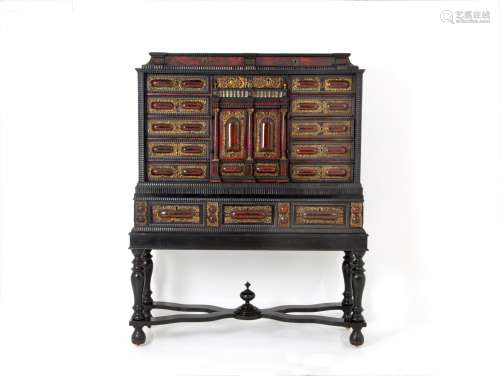 Wooden cabinet with bronze details. North Europe